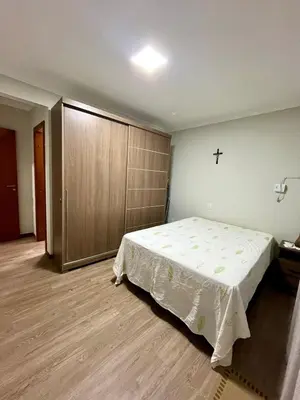 Uma cama ou camas num quarto em Apto Meia Praia/Itapema