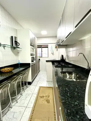 A cozinha ou kitchenette de Apto Meia Praia/Itapema