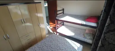 Uma cama ou camas num quarto em Casa de férias