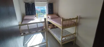 Uma cama ou camas num quarto em Casa de férias