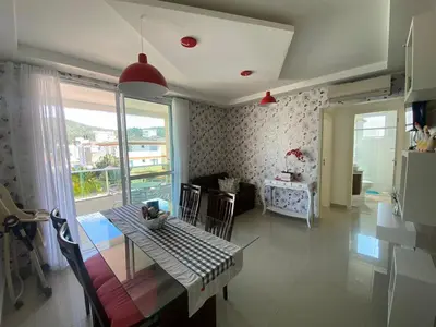 Uma área de estar em Apartamento palmas 2 dormitorios