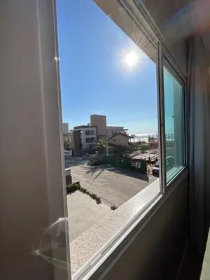 Uma varanda ou terraço em ANSNEGOCIOS APTO FRENTE PRAIA MARISCAL 202 Corais