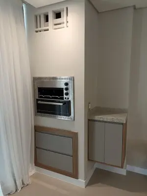 A cozinha ou kitchenette de ANSNEGOCIOS APTO FRENTE PRAIA MARISCAL 202 Corais