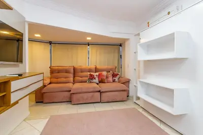 Uma área de estar em 1025 Ampla cobertura duplex na Praia de Bombinhas 50mts do mar