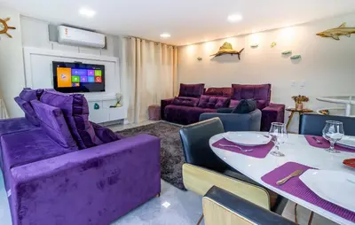 Uma área de estar em 1025 Ampla cobertura duplex na Praia de Bombinhas 50mts do mar