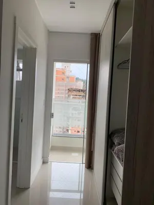 Uma cama ou camas num quarto em Apto aconchegante e elegante Morretes itapema