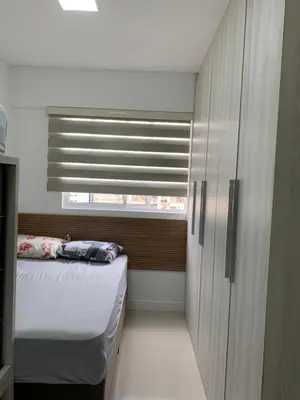 Uma cama ou camas num quarto em Apto aconchegante e elegante Morretes itapema