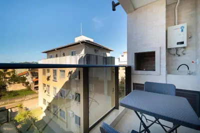 Uma varanda ou terraço em Aluguel Apartamento 2 Suítes Bombinhas