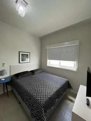Uma cama ou camas num quarto em Apto Praia de Palmas