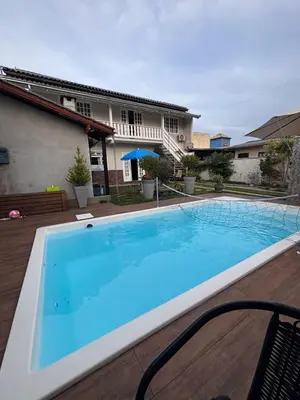 A piscina em ou perto de Casa com piscina Balneário Camboriú CasaAlbertiBc