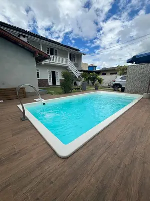 A piscina em ou perto de Casa com piscina Balneário Camboriú CasaAlbertiBc