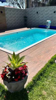 A piscina em ou perto de Casa com piscina Balneário Camboriú CasaAlbertiBc