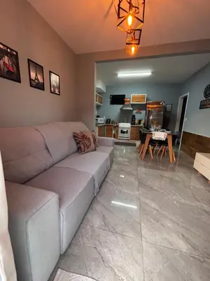 Uma área de estar em Casa com piscina Balneário Camboriú CasaAlbertiBc