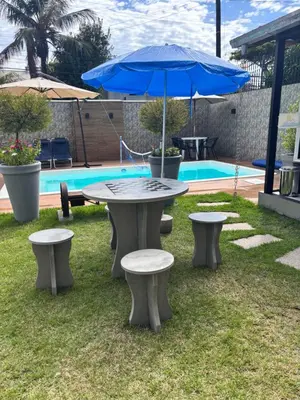 A piscina em ou perto de Casa com piscina Balneário Camboriú CasaAlbertiBc