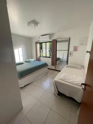 Uma cama ou camas num quarto em Casa deck caixa d´aço