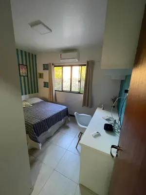 Uma cama ou camas num quarto em Casa deck caixa d´aço