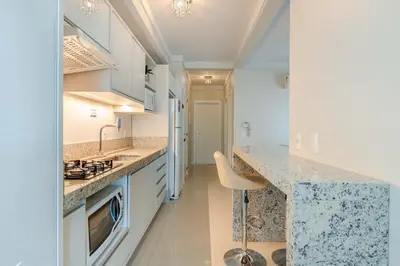 A cozinha ou kitchenette de Apartamento com Vista Mar na Praia do Canto Grande