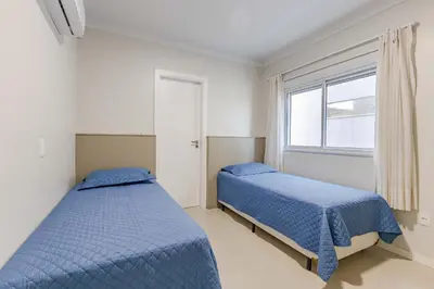 Uma cama ou camas num quarto em Apartamento com Vista Mar na Praia do Canto Grande
