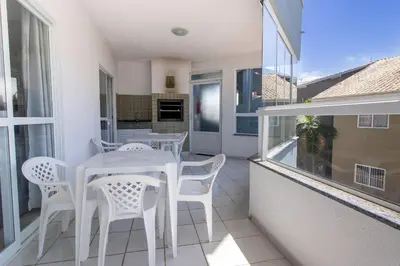 Uma varanda ou terraço em 1046 - Praia de Bombinhas locação de temporada - Residencial Solar das Bromélias Apto 121