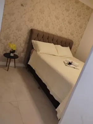 Uma cama ou camas num quarto em Apartamento novo Gran Safira
