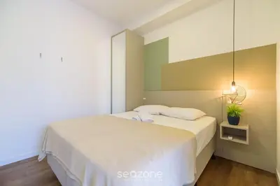 Uma cama ou camas num quarto em Lindos Studios VEC