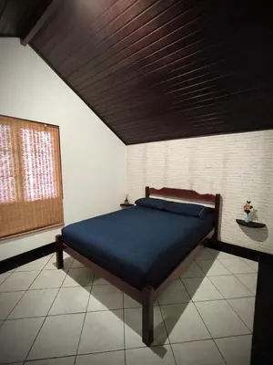 Uma cama ou camas num quarto em Cabelera's House