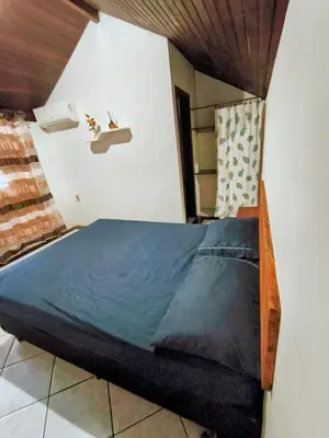 Uma cama ou camas num quarto em Cabelera's House