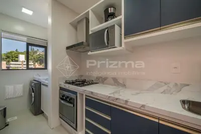 A cozinha ou kitchenette de 401 Bl 03 - WaldGarten Bombinhas - 50 m do Mar - Condomínio de Alto Padrão - Piscina - Academia - Salão de jogos