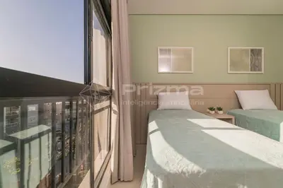 Uma cama ou camas num quarto em 304 Bl 01 - WaldGarten Bombinhas - 50 m do Mar e Frente Avenida - Condomínio de Alto Padrão - Piscina - Academia - Salão de jogos