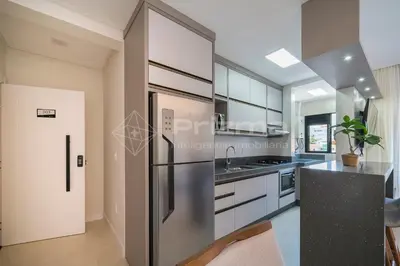 A cozinha ou kitchenette de 303 Bl 03 - WaldGarten Bombinhas - 50 m do Mar - Condomínio de Alto Padrão - Piscina - Academia - Salão de jogos
