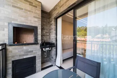 Uma varanda ou terraço em 303 Bl 03 - WaldGarten Bombinhas - 50 m do Mar - Condomínio de Alto Padrão - Piscina - Academia - Salão de jogos