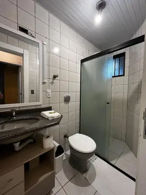 Uma casa de banho em Apartamento quadra mar Meia Praia