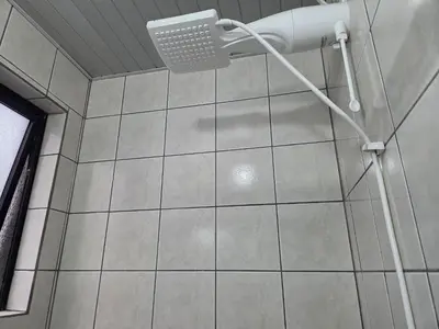 Uma casa de banho em Apartamento quadra mar Meia Praia
