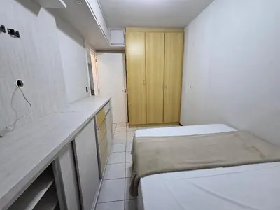 Uma cama ou camas num quarto em Apartamento quadra mar Meia Praia