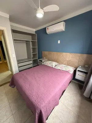 Uma cama ou camas num quarto em Ap Bombinhas Completo 100 metros do mar na Aluguejaah