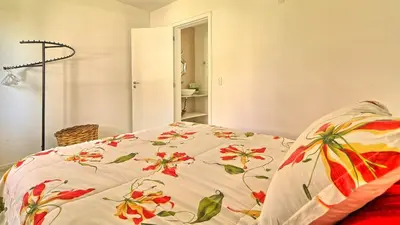 Uma cama ou camas num quarto em #007 Linda casa piscina enorme na praia de Palmas