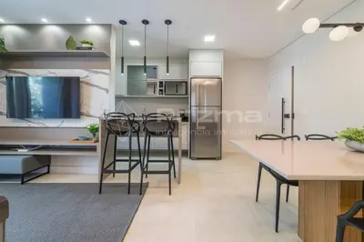 A cozinha ou kitchenette de 303 Bl 01 - WaldGarten Bombinhas - 50 m do Mar e Frente Avenida - Condomínio de Alto Padrão - Piscina - Academia - Salão de jogos
