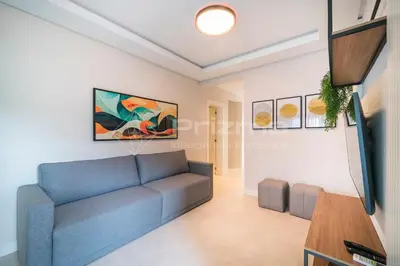 Uma televisão e/ou sistema de entretenimento em Mario Guilherme - Apto 202 - Lindo apartamento condomínio de alto padrão com piscina e academia.