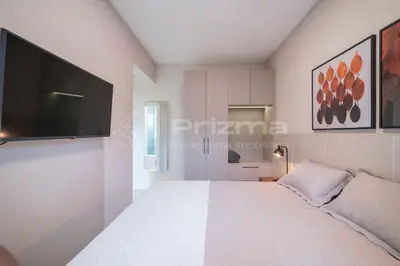 Uma cama ou camas num quarto em Mario Guilherme - Apto 202 - Lindo apartamento condomínio de alto padrão com piscina e academia.