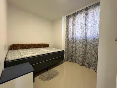 Uma cama ou camas num quarto em Apartamento Novo e Confortável