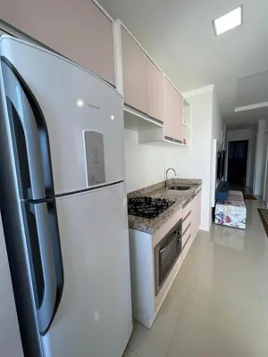 A cozinha ou kitchenette de Apartamento Novo e Confortável