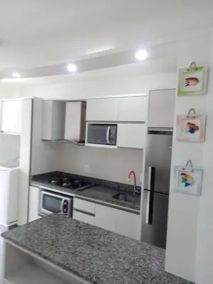 A cozinha ou kitchenette de Cantinho Aconchegante Bombinhas