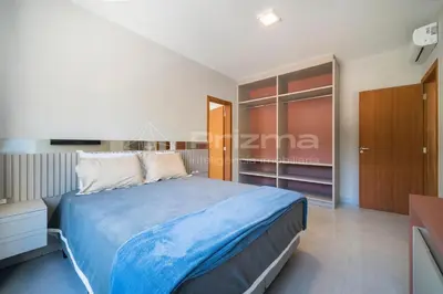 Uma cama ou camas num quarto em Lindo duplex geminado na Praia de Mariscal.