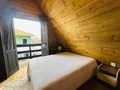 Uma cama ou camas num quarto em Praia de Palmas - Chalé