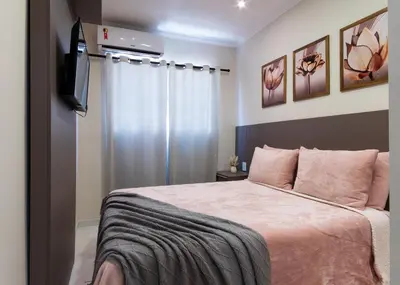 Uma cama ou camas num quarto em Hotel Gigante Beach Itapema