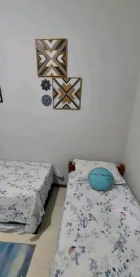 Uma cama ou camas num quarto em Cobertura Duplex 250m da Praia, Férias Perfeitas