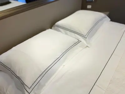 Uma cama ou camas num quarto em Beira Mar com Excelente Localização
